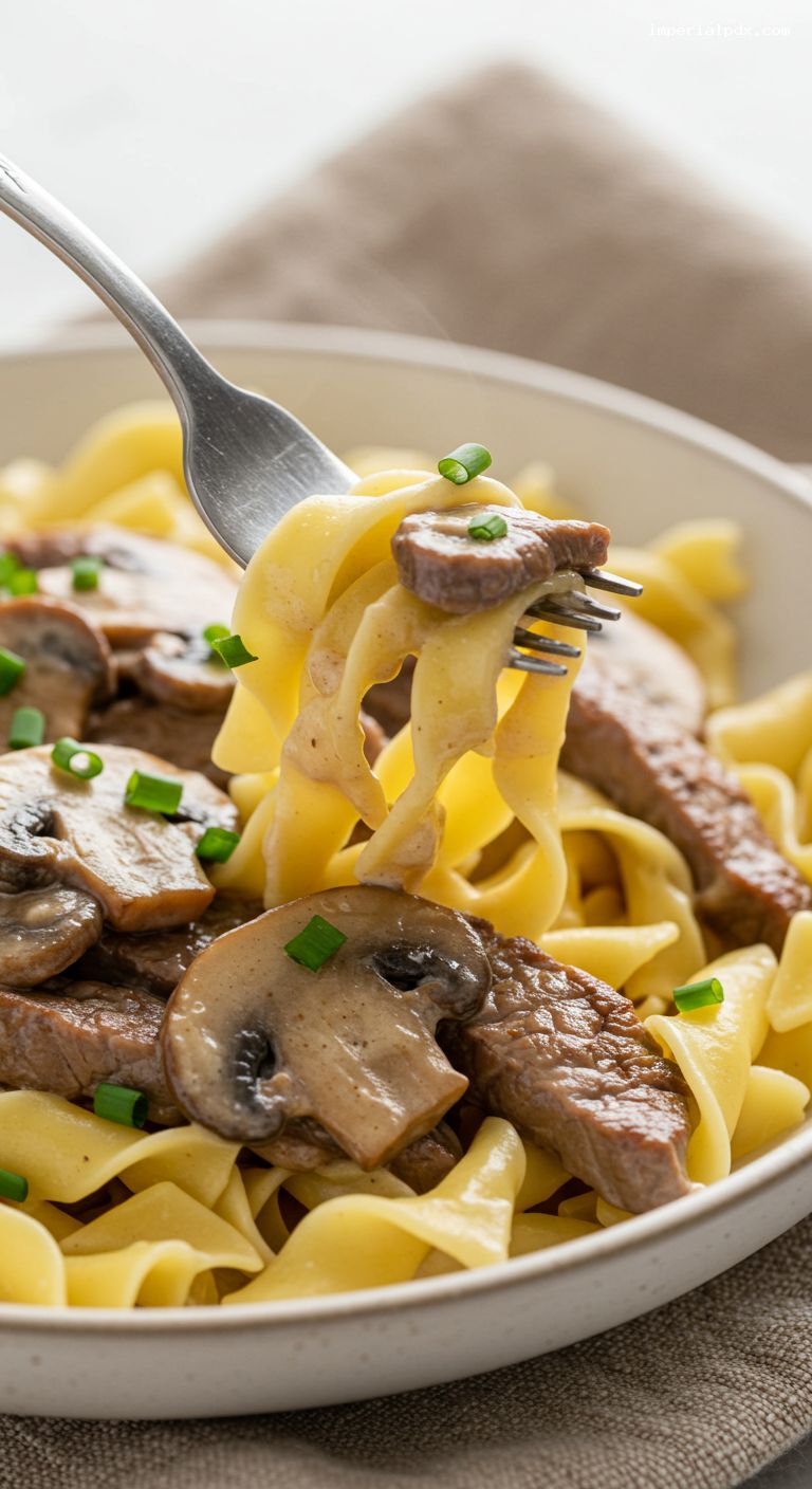 Beef Stroganoff Noodles with Mushrooms and Chives – Closeup
