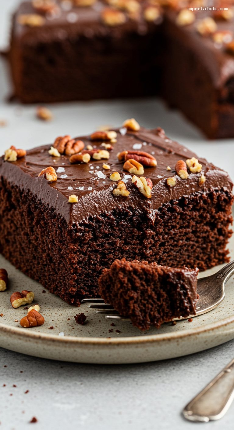 Dr Pepper Chocolate Snack Cake with Fudge Frosting and Pecans – Closeup