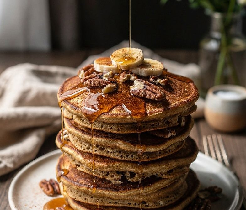 Banana Bread Pancakes With Toasted Walnuts and Maple Syrup