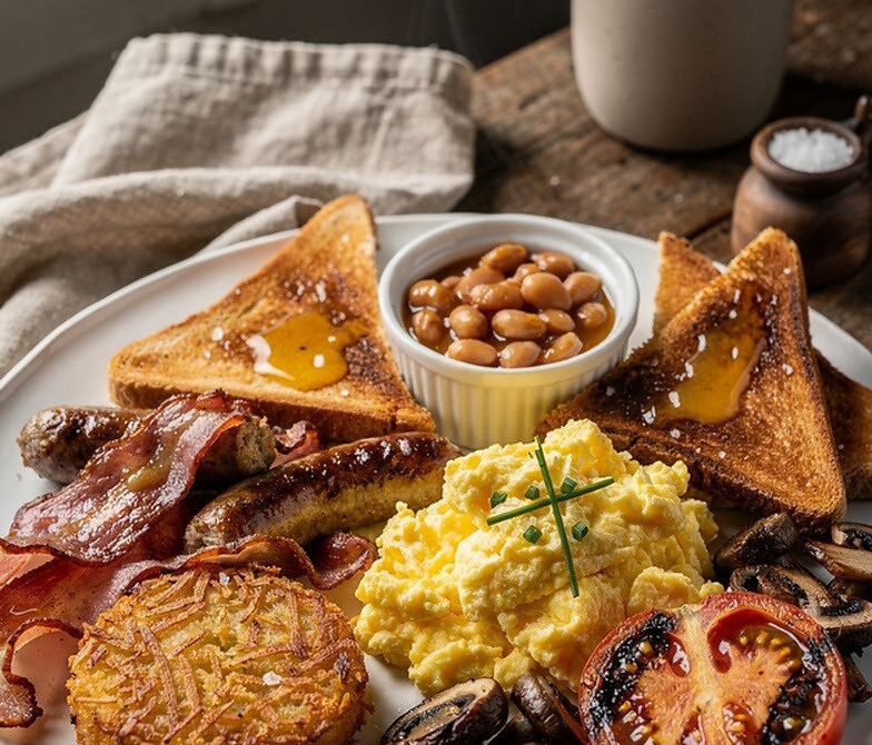Classic Full English Breakfast Platter With Bacon and Eggs