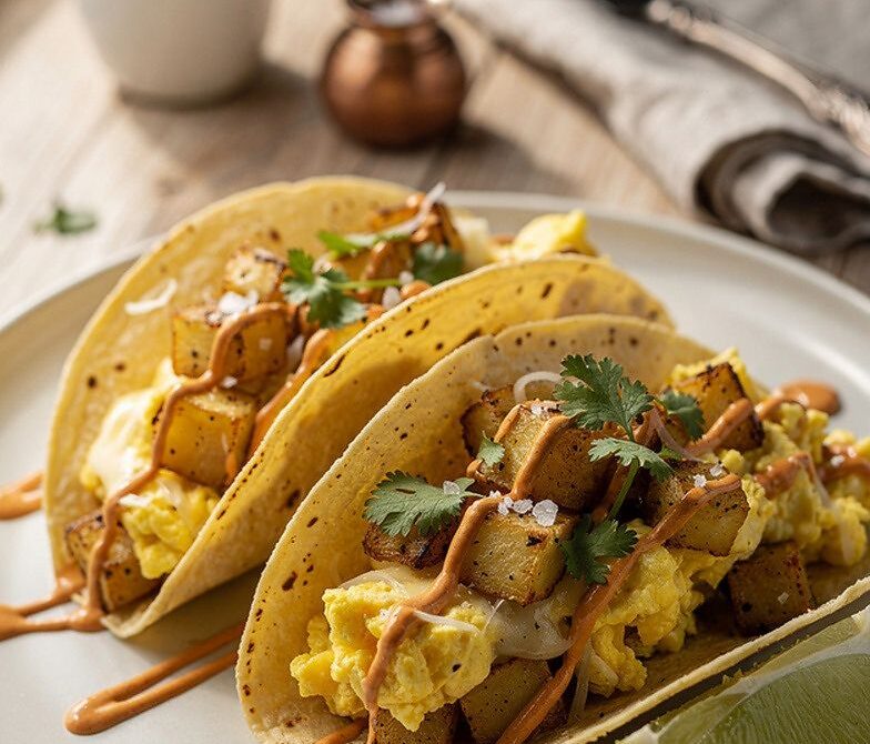 Crispy Breakfast Potato Tacos With Eggs and Chipotle Crema