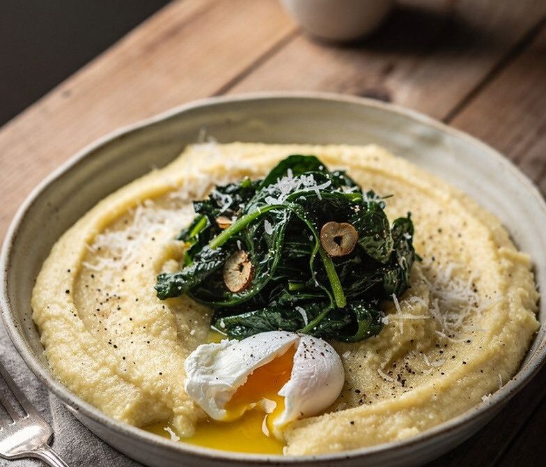 Parmesan Polenta Breakfast Bowl with Garlicky Greens and Poached Egg