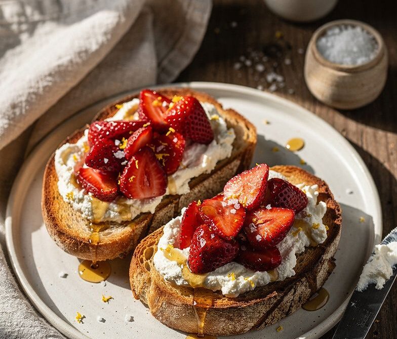 Ricotta Toast With Roasted Strawberries, Honey, and Flaky Salt