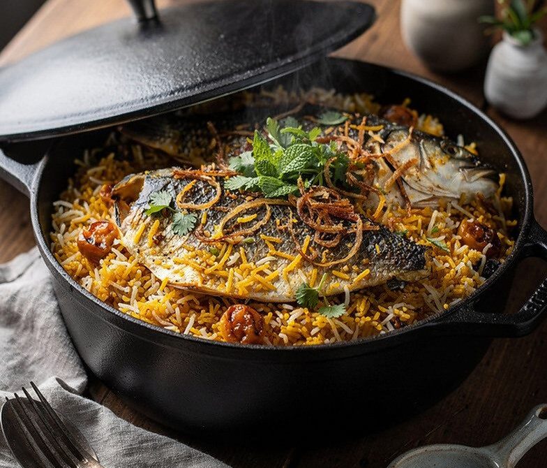 Saffron Fish Biryani With Mint, Fried Onions, and Yogurt Marinade