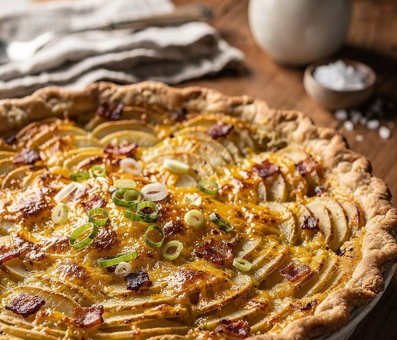 Bacon, Potato, and Cheddar Pie with Creamy Scallion Sauce
