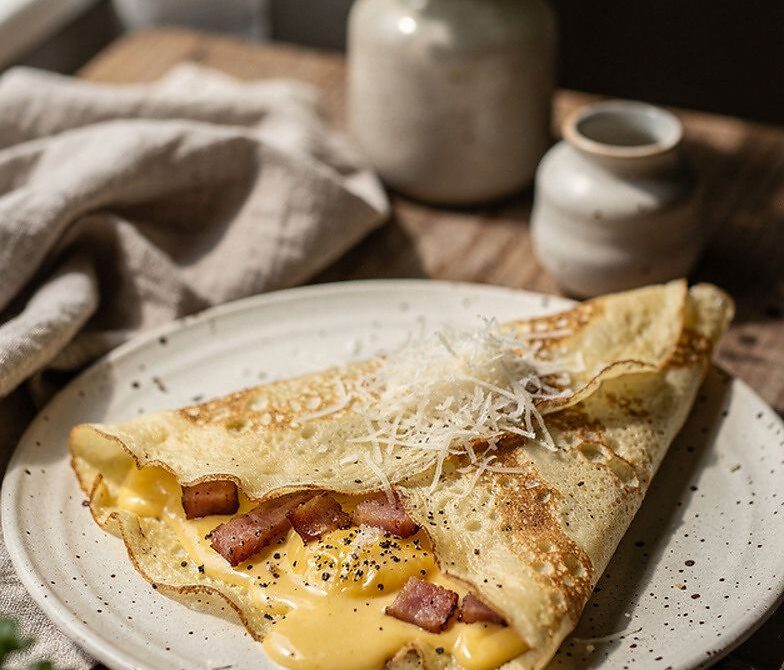 Carbonara Crepes With Crispy Pancetta and Black Pepper