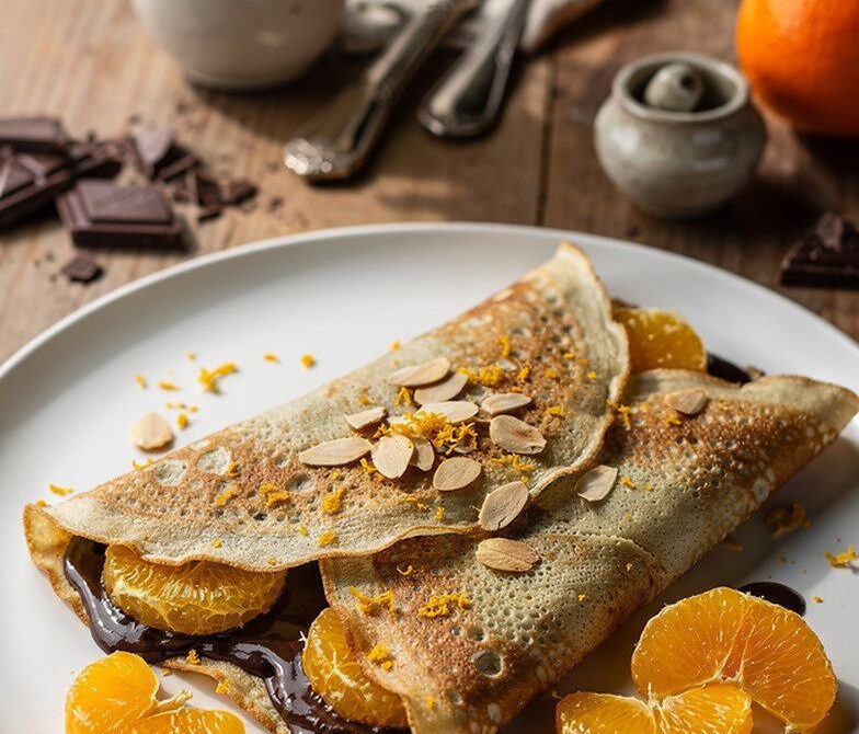 Chocolate Orange Crepes with Dark Chocolate Ganache and Toasted Almonds