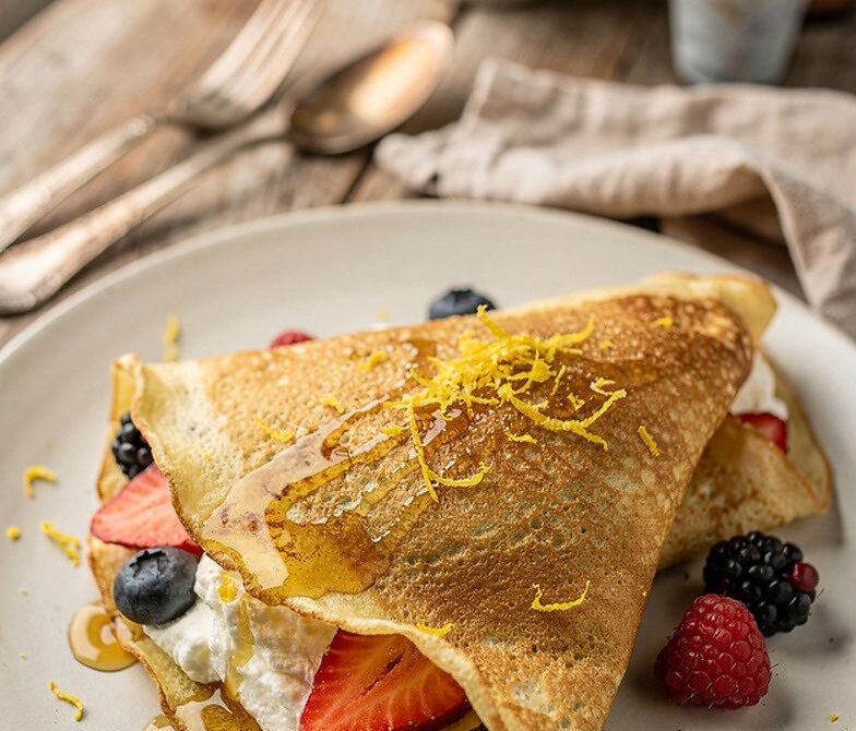 Honey Mascarpone Berry Crepes With Lemon Zest