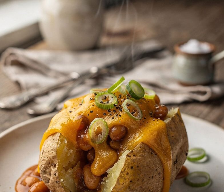 Microwave Jacket Potato With Baked Beans and Cheddar