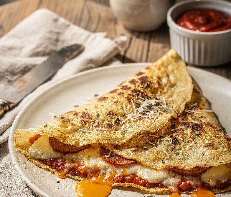 Pepperoni Pizza Crepes With Marinara and Mozzarella