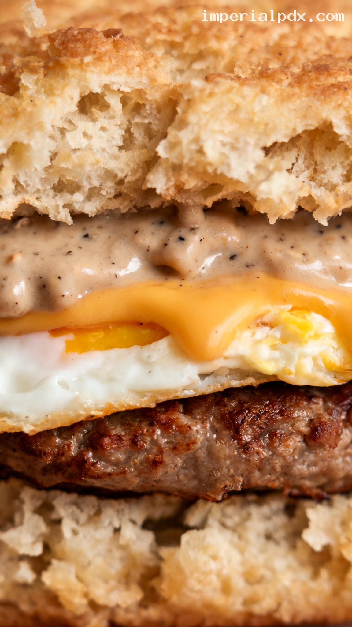 Breakfast Sausage Egg and Cheddar Biscuit Burger – Closeup