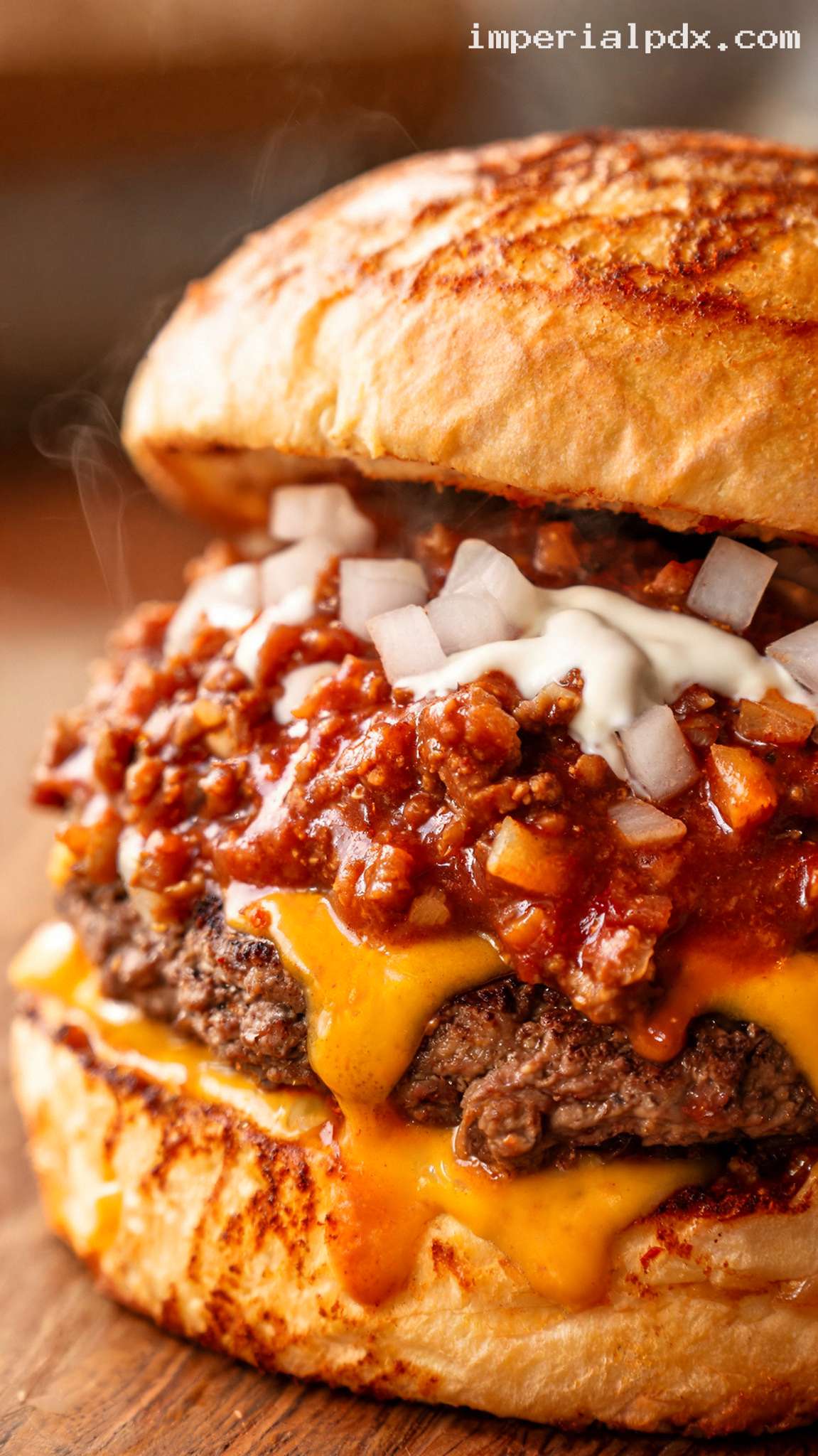 Diner-Style Chili Cheese Burger With Cheddar – Closeup