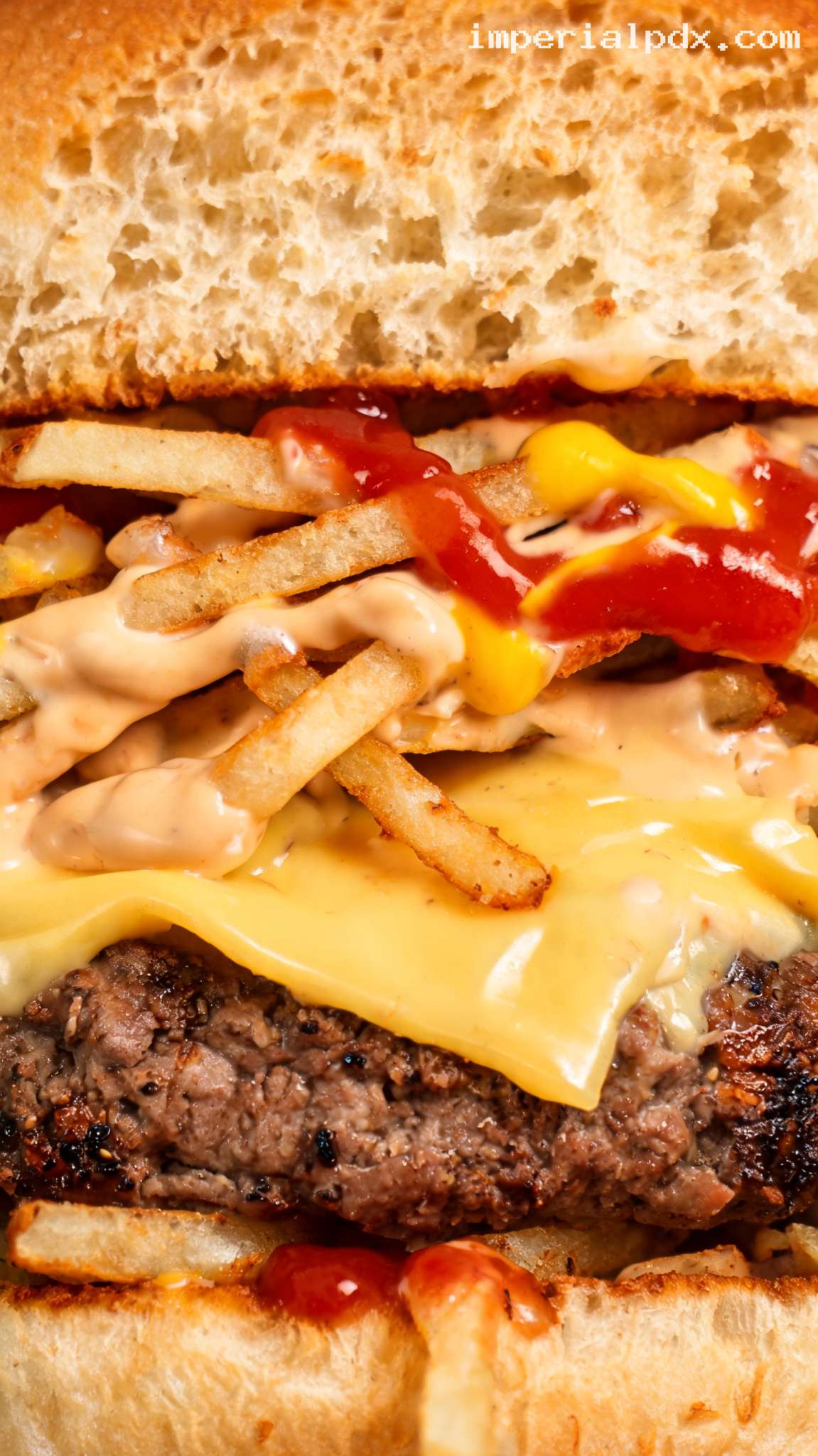 Diner-Style French Fry Burger With American Cheese – Closeup