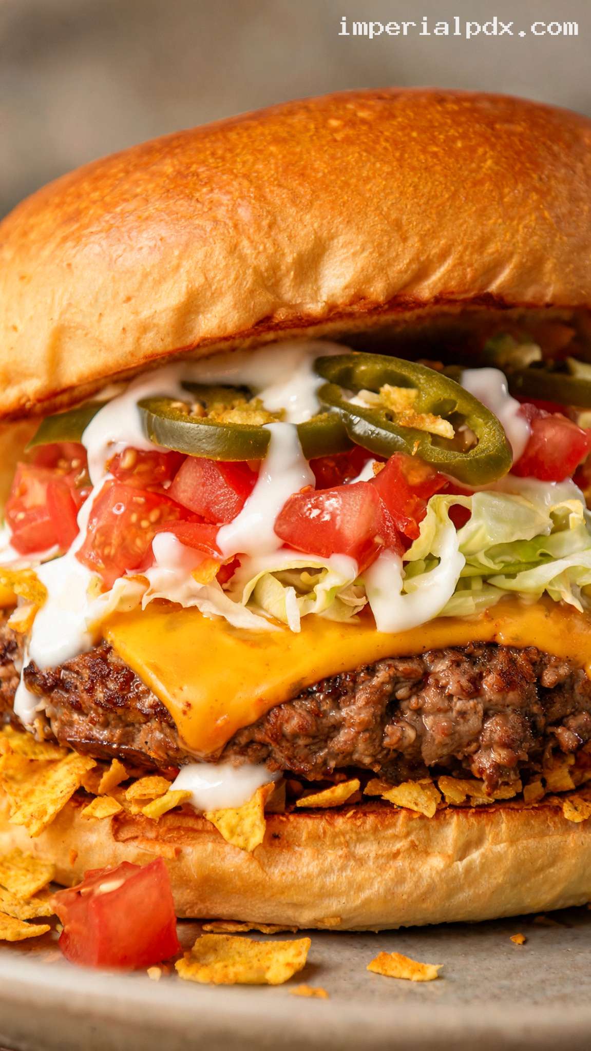 Loaded Taco Burger With Crunchy Tortilla Chips – Closeup