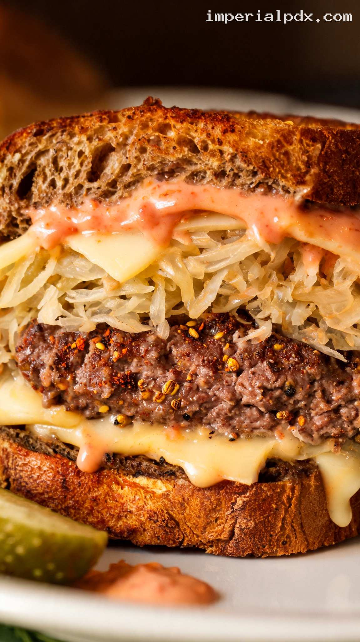Reuben Burger With Swiss and Sauerkraut – Closeup