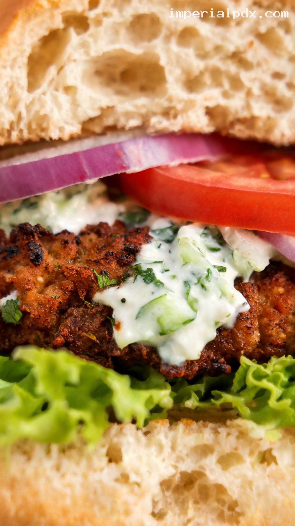 Tikka Spiced Chicken Burger With Cucumber Raita – Closeup