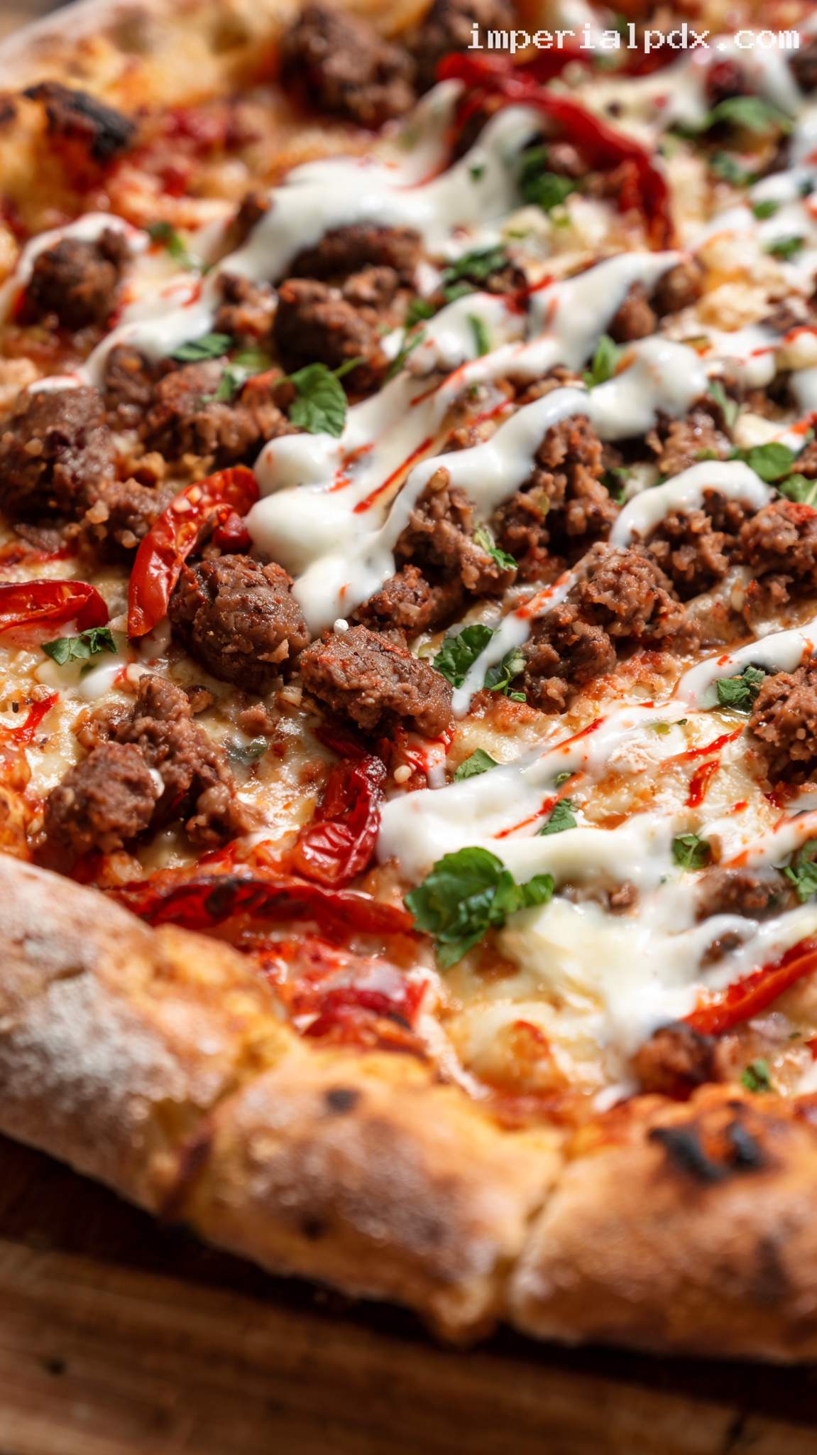 Harissa Lamb Merguez Pizza With Yogurt-Mint Drizzle – Closeup