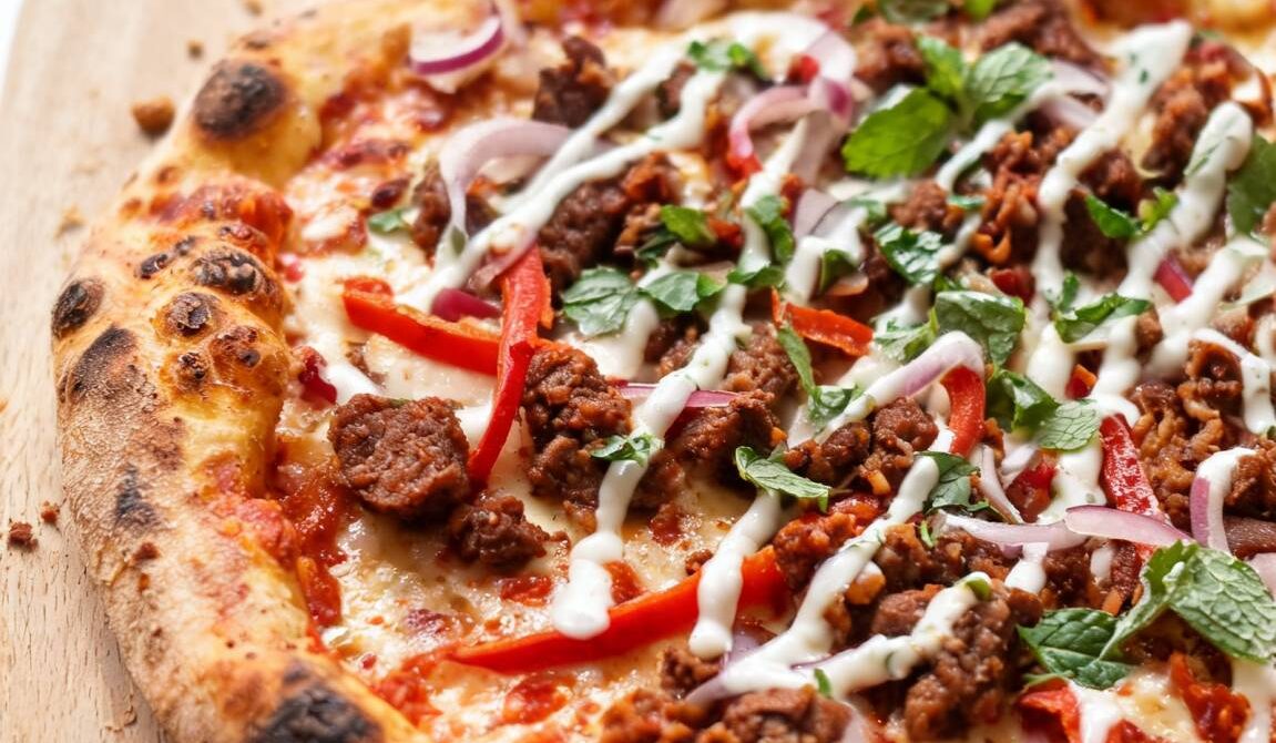 Harissa Lamb Merguez Pizza With Yogurt-Mint Drizzle