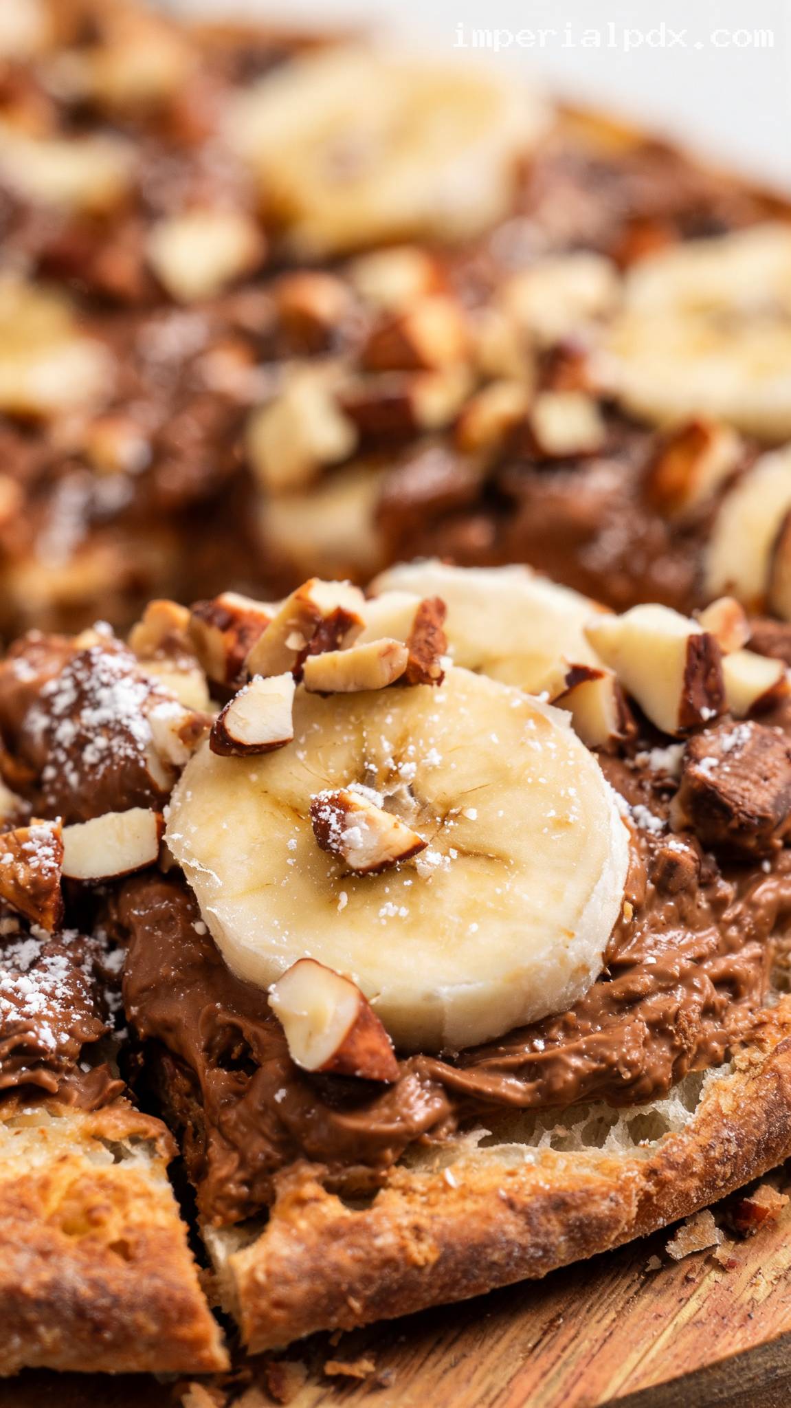 Nutella Banana Dessert Pizza With Toasted Hazelnuts – Closeup