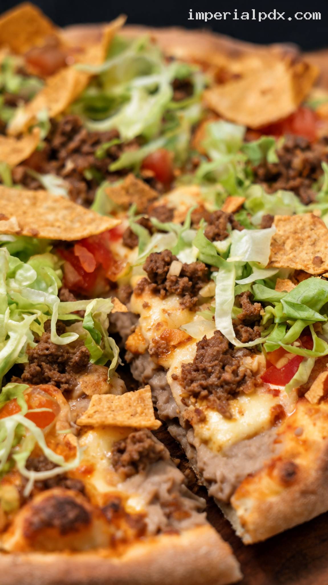 Taco Pizza With Ground Beef And Refried Beans – Closeup