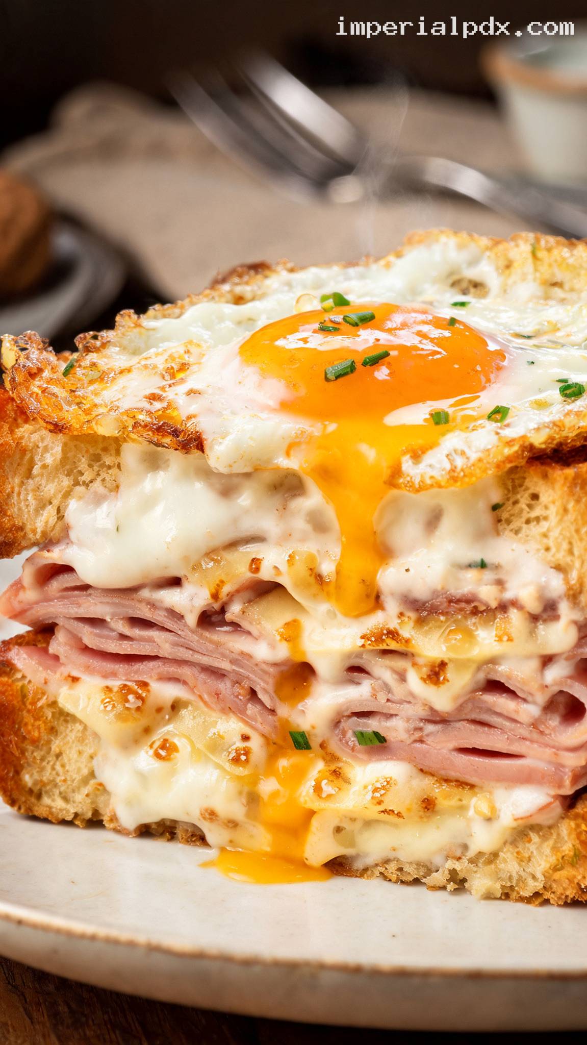 Classic Croque Madame With Ham, Gruyère, and Fried Egg – Closeup