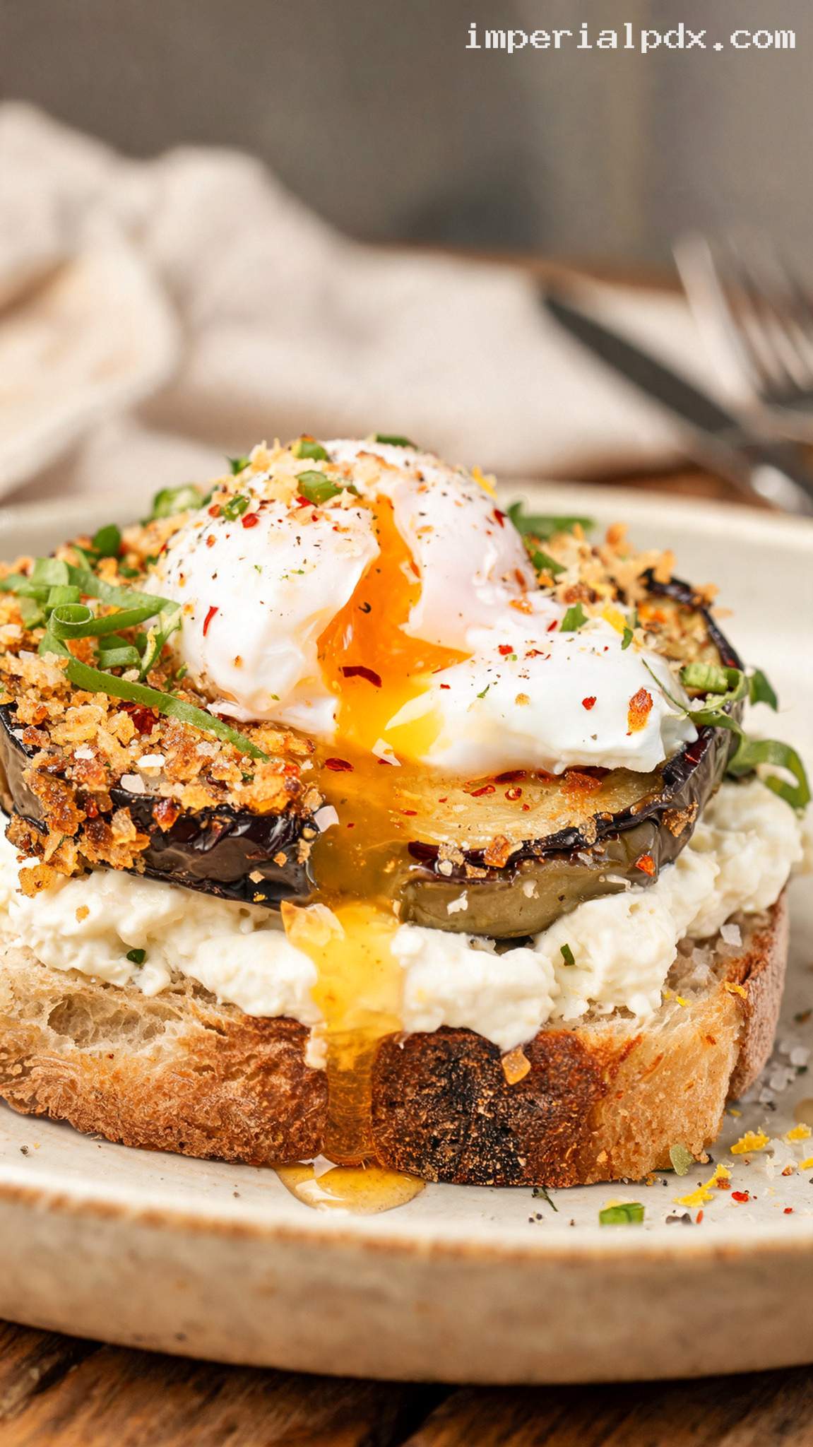 Crispy Eggplant and Poached Egg Toast With Chili Honey – Closeup