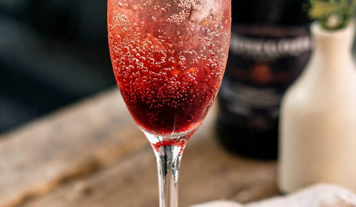 Elegant Kir Royale Cocktail With Blackcurrant and Champagne