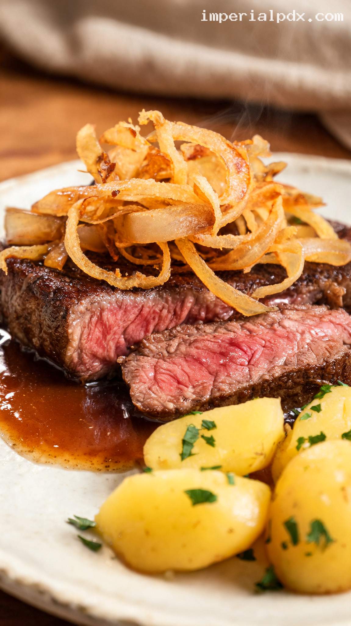 Zwiebelrostbraten With Crispy Onions and Buttery Potatoes – Closeup
